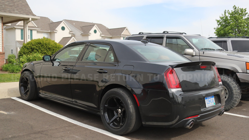 Illustration for article titled What The Hell Is This Widebody Chrysler 300 SRT With Dodge Demon Wheels?
